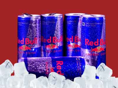 Red bull energy drinks over ice