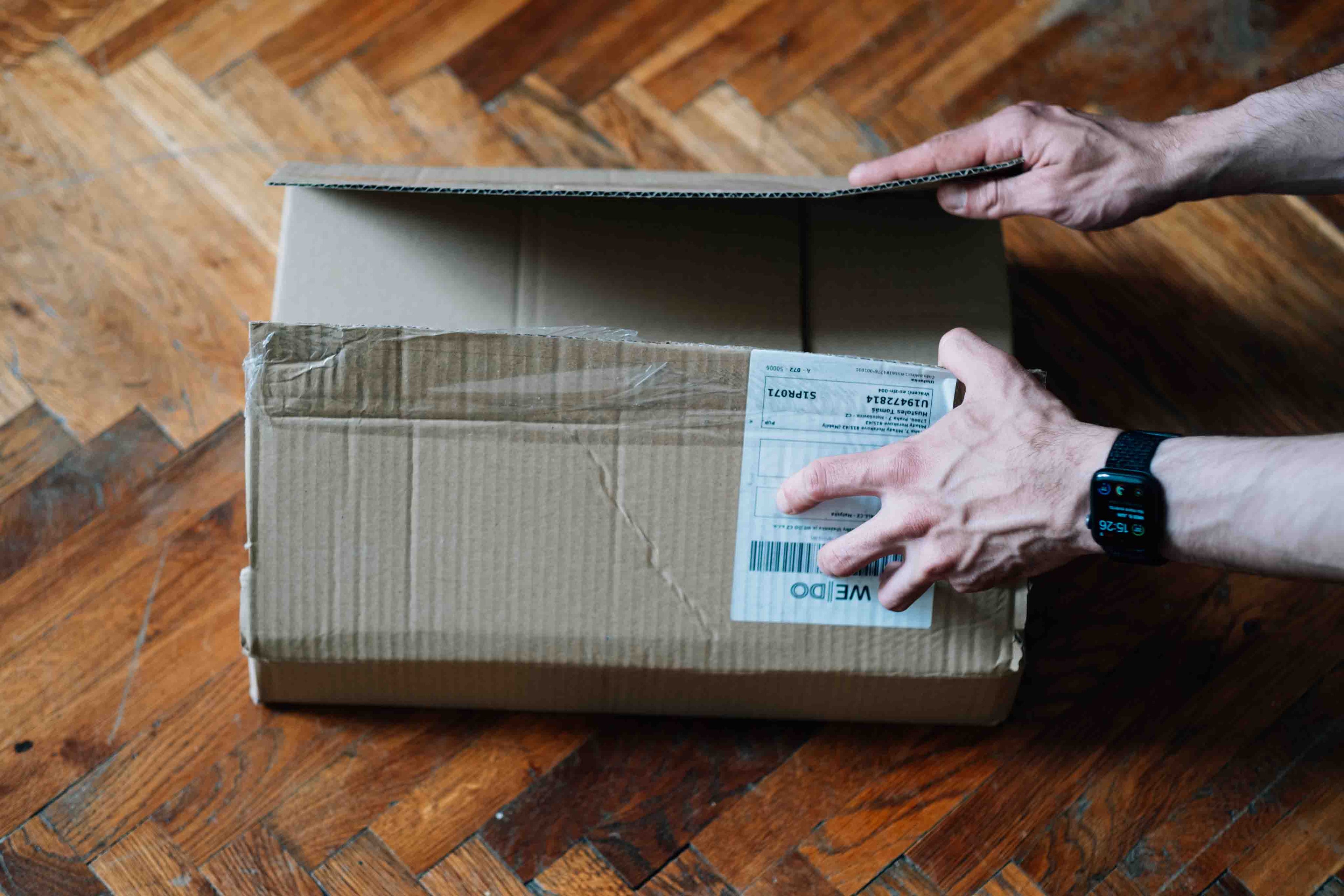 Mailorder package being opened